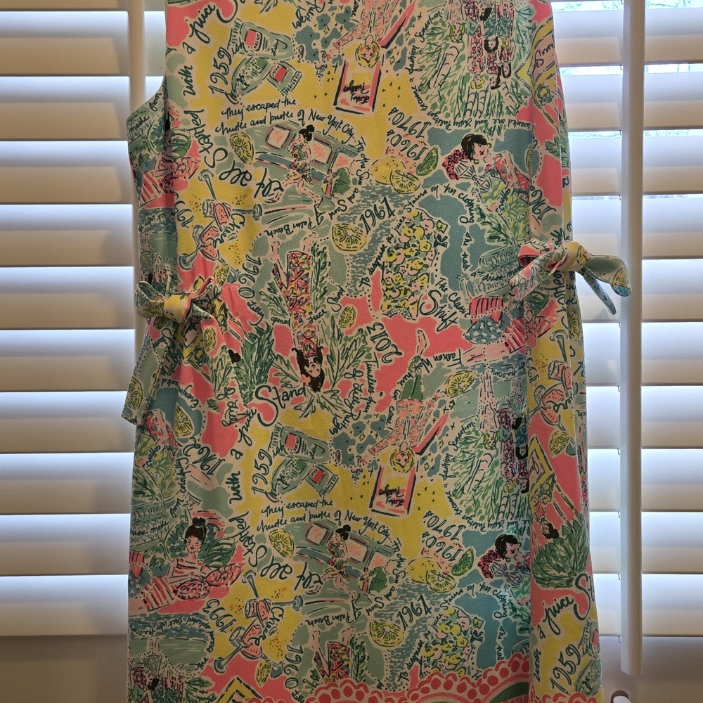 Colorful Sleeveless Dress with Bow Details